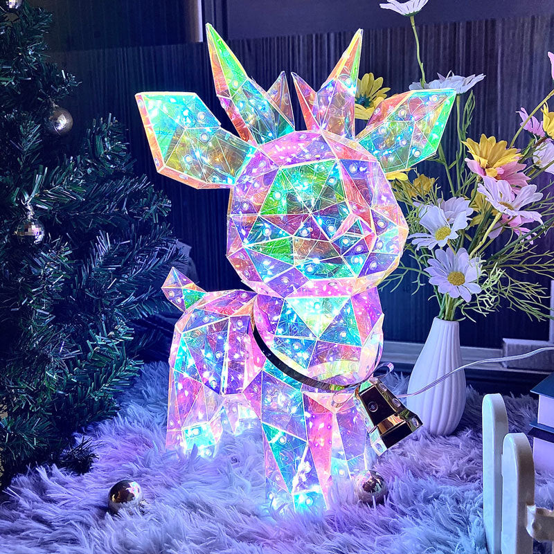 Prismatisk juletræspynt med stjernetop