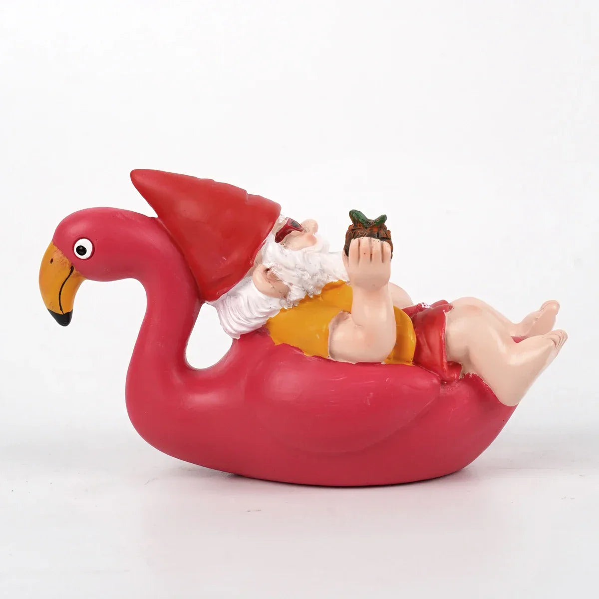 Tropisk havefigur af en flamingo med nissehue