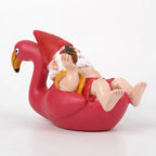 Tropisk havefigur af en flamingo med nissehue