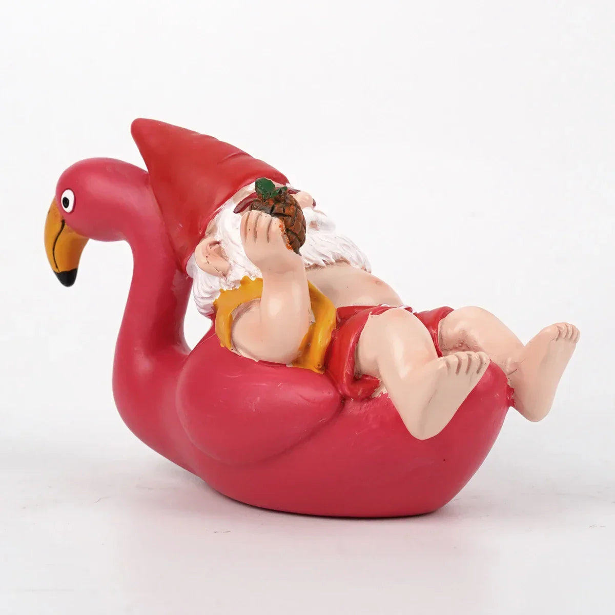 Tropisk havefigur af en flamingo med nissehue