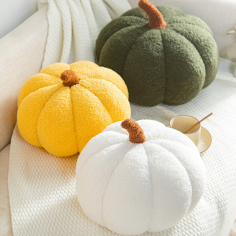 Cojín decorativo con forma de calabaza, de tela texturizada y diseño afelpado