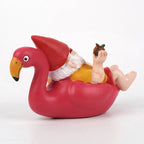 Tropisk havefigur af en flamingo med nissehue