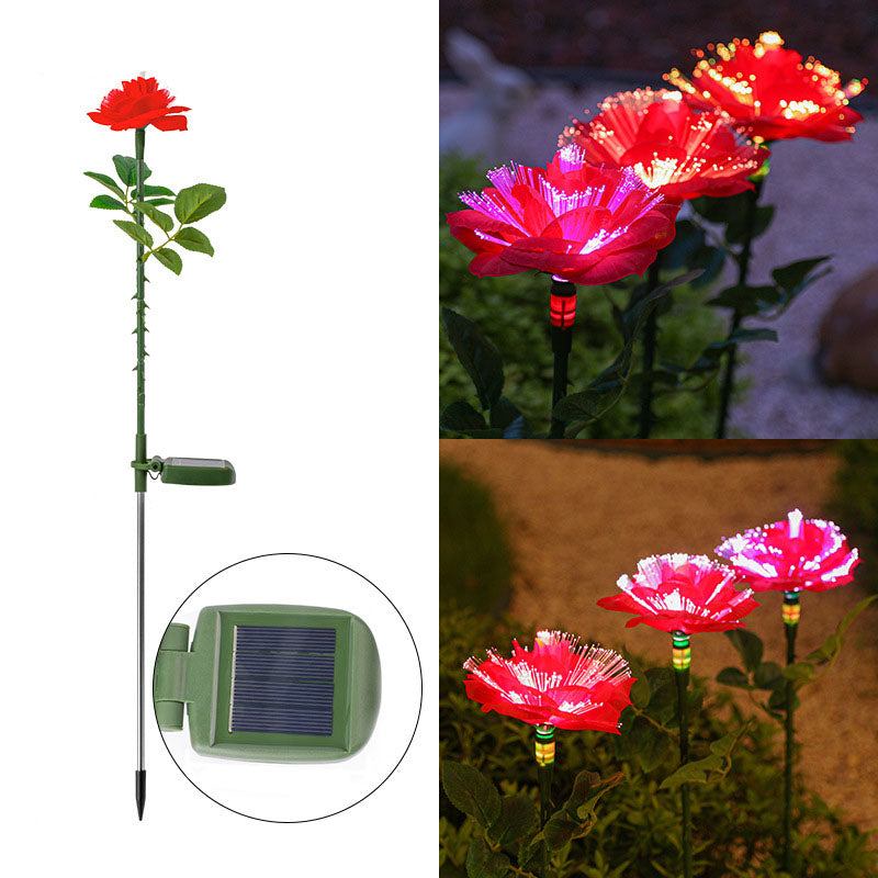 Solcellsdriven trädgårdsbelysning med blomma, påle och färgglatt LED-sken