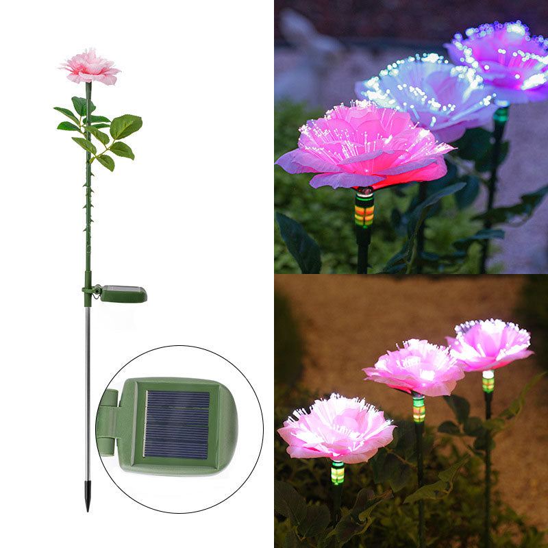 Solcellsdriven trädgårdsbelysning med blomma, påle och färgglatt LED-sken