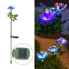 Solcellsdriven trädgårdsbelysning med blomma, påle och färgglatt LED-sken