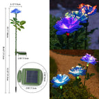 Solcellsdriven trädgårdsbelysning med blomma, påle och färgglatt LED-sken