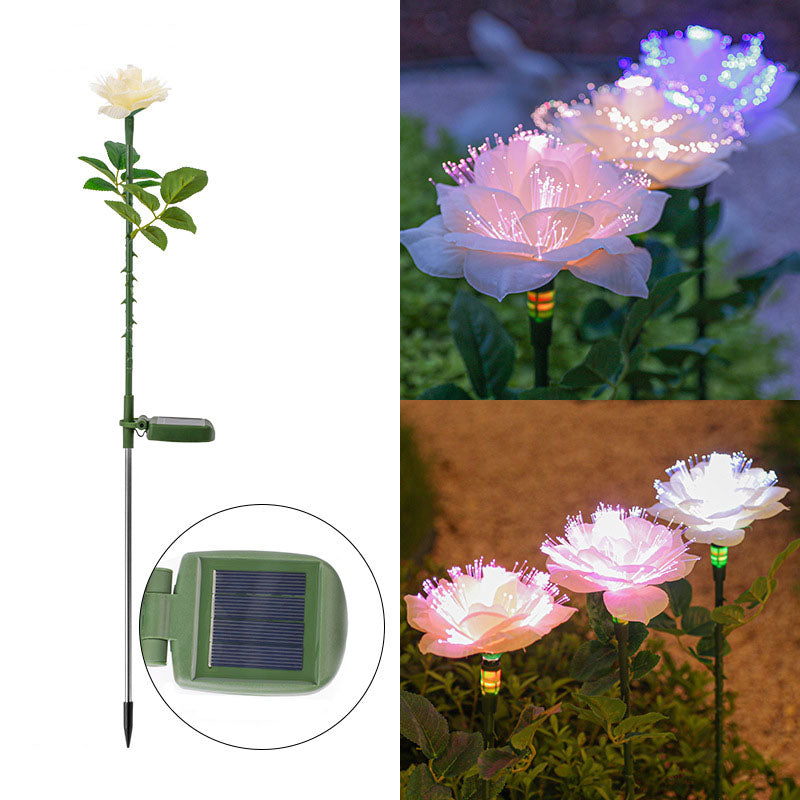 Solcellsdriven trädgårdsbelysning med blomma, påle och färgglatt LED-sken