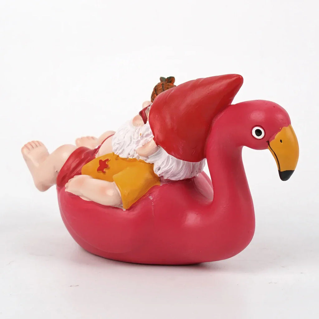 Tropisk havefigur af en flamingo med nissehue