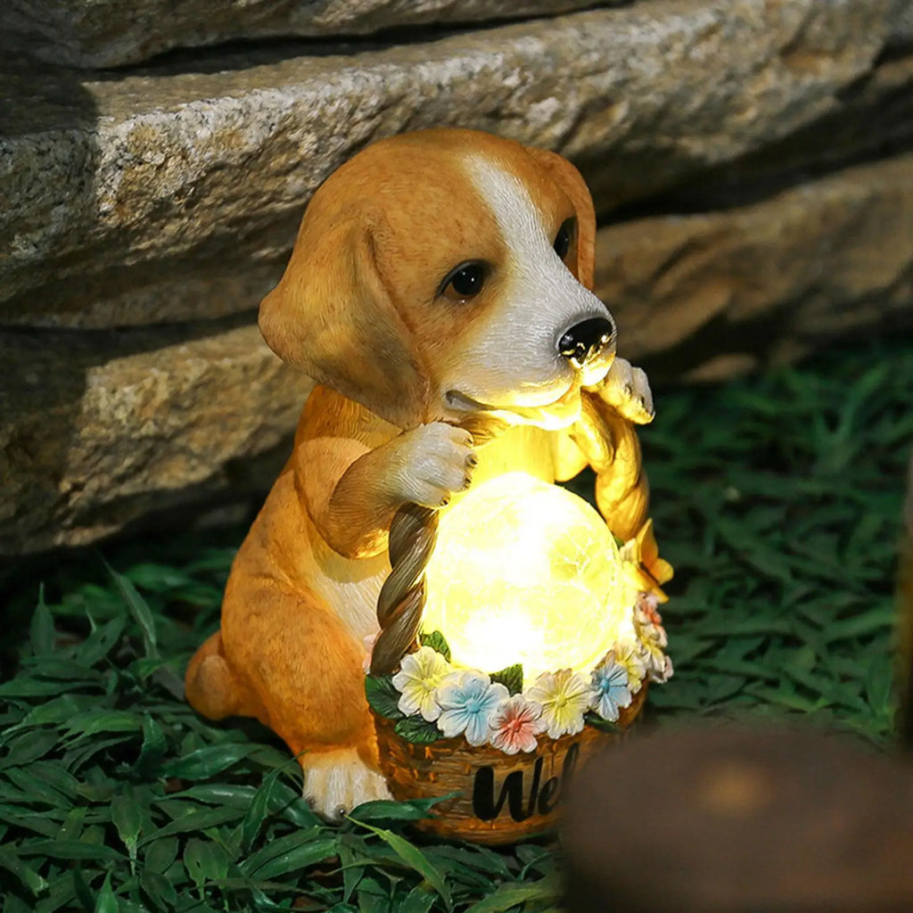 Solcelledrevet hundehavefigur med lysende LED-kugle