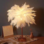 Lampada da tavolo LED con piume di struzzo