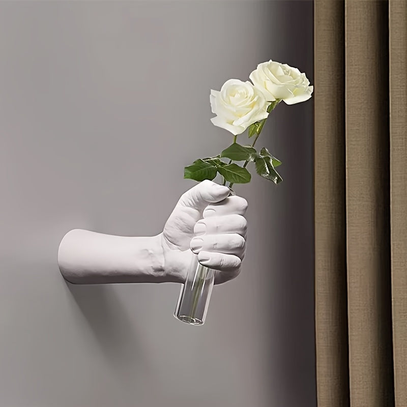 Jarrón de pared con forma de mano para flores