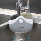Küchenspülschwammhalter mit Abflusslöchern und Ablage neben dem Wasserhahn