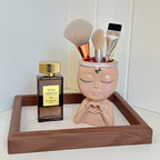 Organizador de brochas de maquillaje con forma de rostro