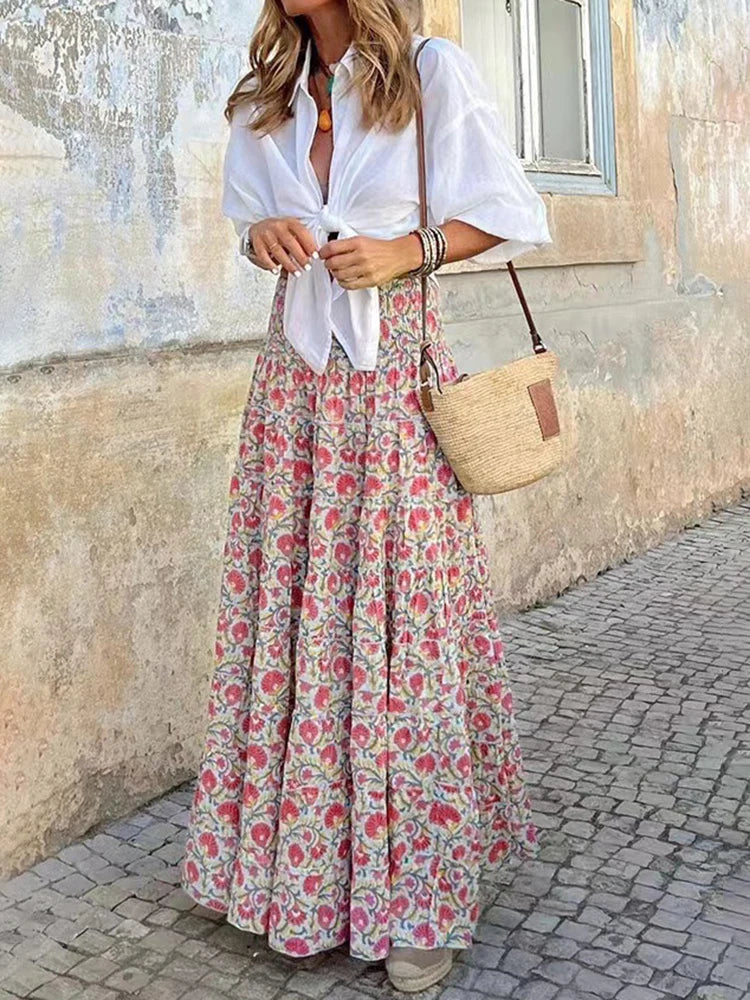 Kvinders boheme blomsterprint lagdelt maxi nederdel med høj talje, flydende A-linje silhuet og flæsekant