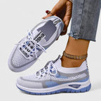 Sneakers da donna traspiranti in mesh con lacci