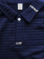 Camiseta polo de hombre con botones hasta el cuarto, manga larga y textura