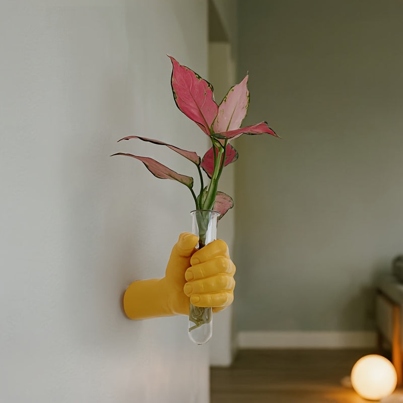 Jarrón de pared con forma de mano para flores