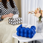 Portapañuelos con diseño de burbujas metálicas para interiores modernos
