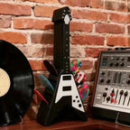 Soporte para púas con forma de guitarra