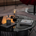 Genopladelig LED-bordlampe formet som en lysestage med berøringsstyring