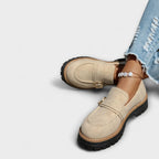 Mocassins pour femmes à semelle crantée et boucles