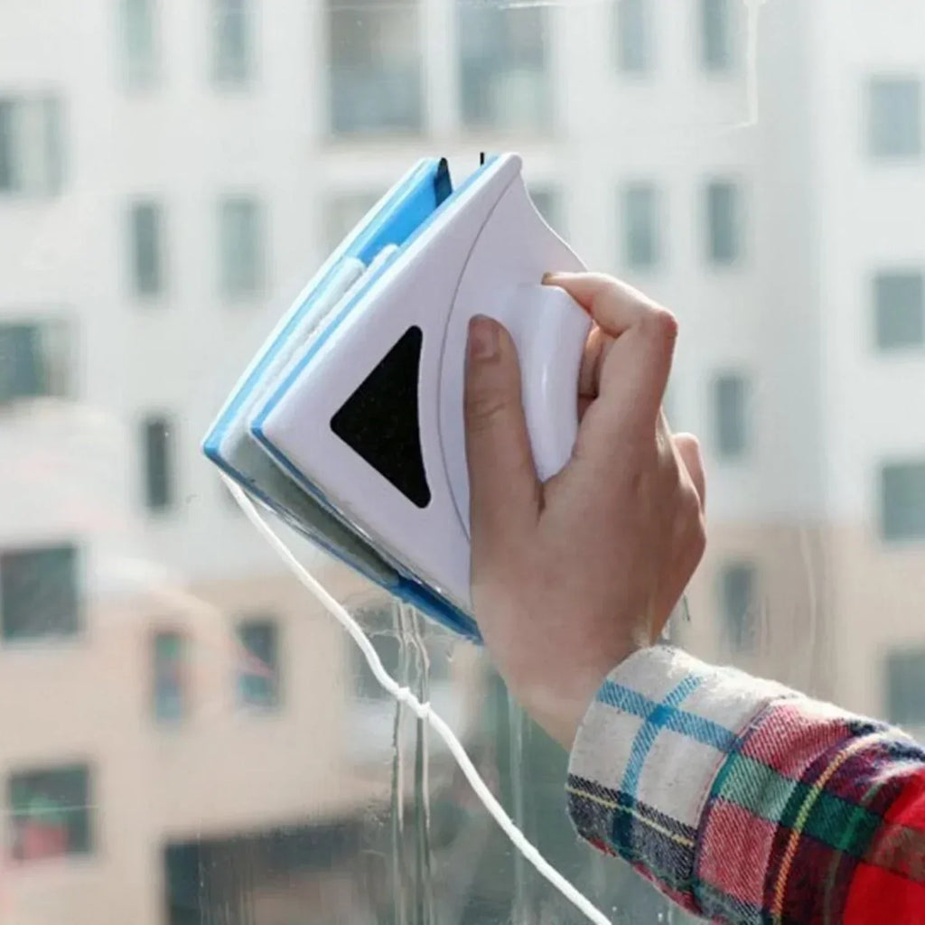 Outil magnétique de nettoyage des vitres
