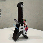 Soporte para púas con forma de guitarra