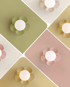 Applique murale en forme de fleur avec lumière en forme de globe