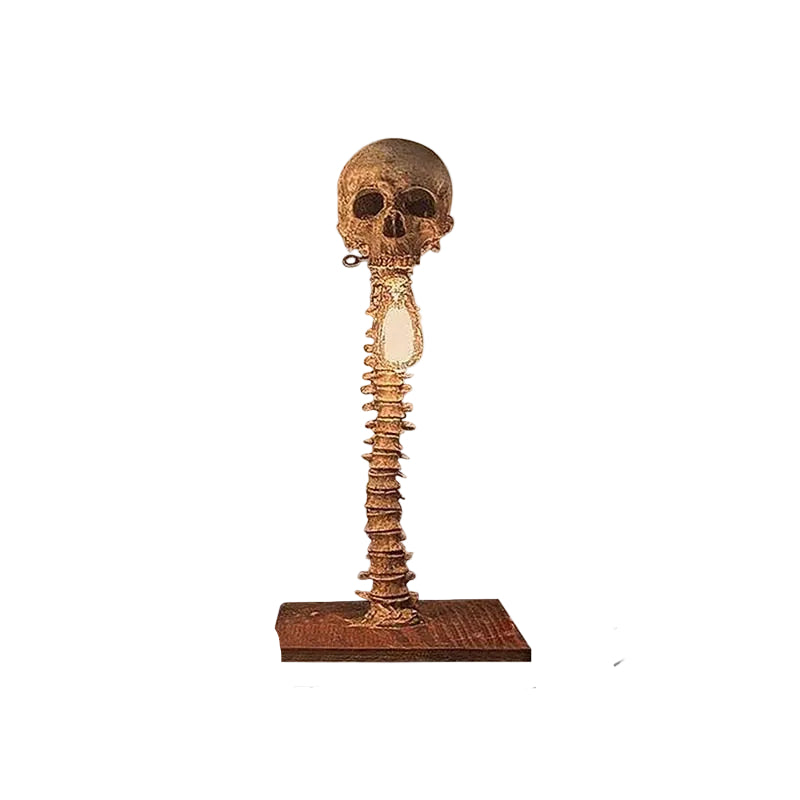 Lámpara de mesa decorativa con calavera y columna vertebral