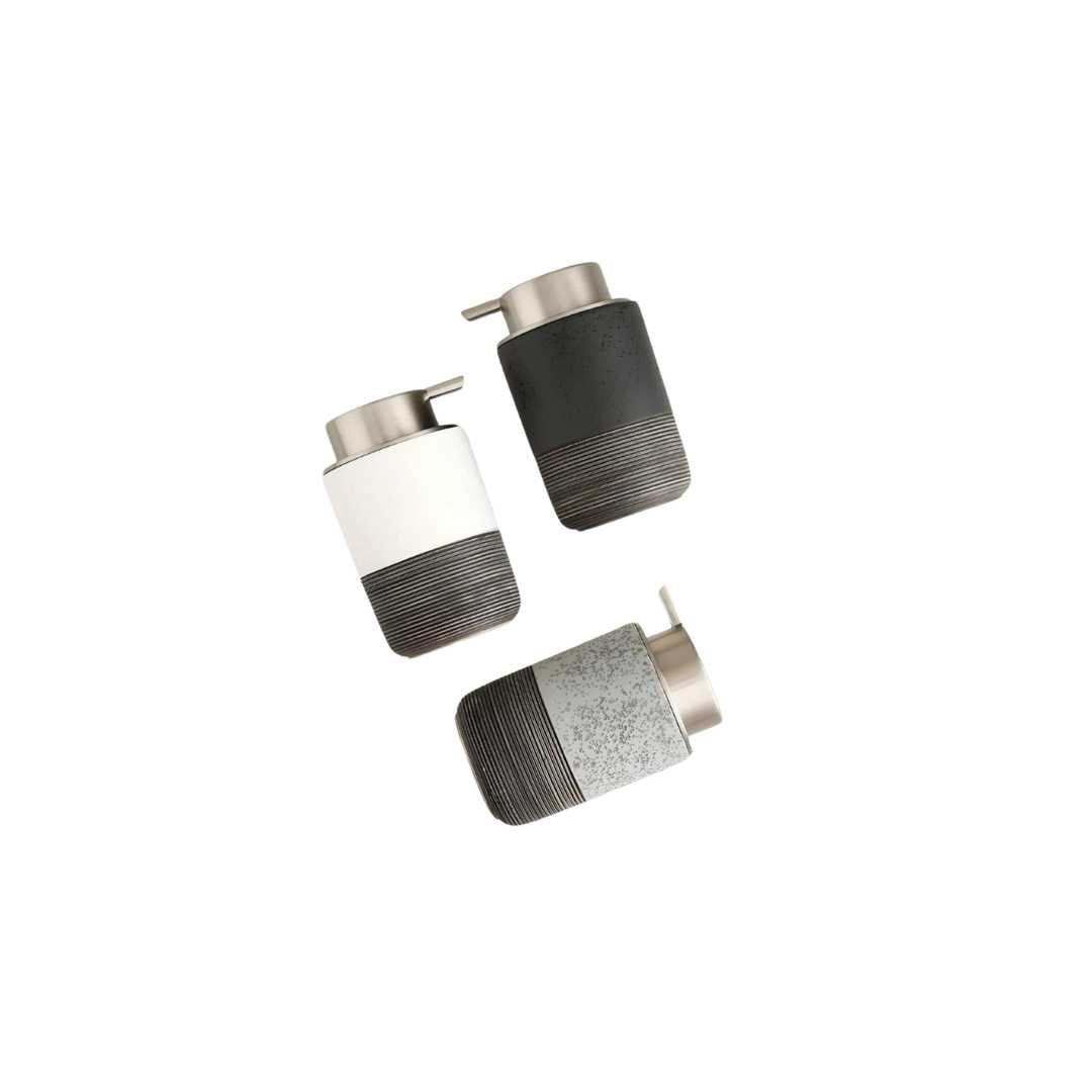 Dispenser di sapone liquido in stile ceramica scanalata con corpo cilindrico e pompa