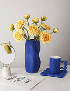 Textured Ceramic Vase with Curved Silhouette and Contemporary Sculpted Form