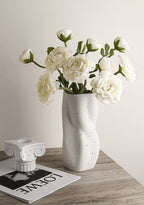 Textured Ceramic Vase with Curved Silhouette and Contemporary Sculpted Form