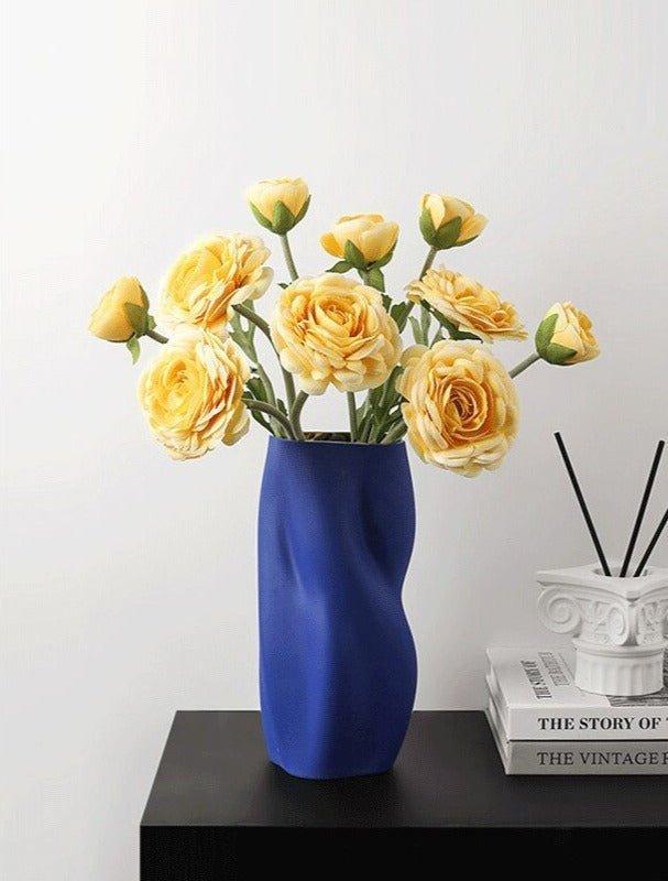 Textured Ceramic Vase with Curved Silhouette and Contemporary Sculpted Form