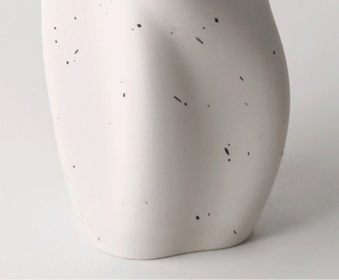 Textured Ceramic Vase with Curved Silhouette and Contemporary Sculpted Form