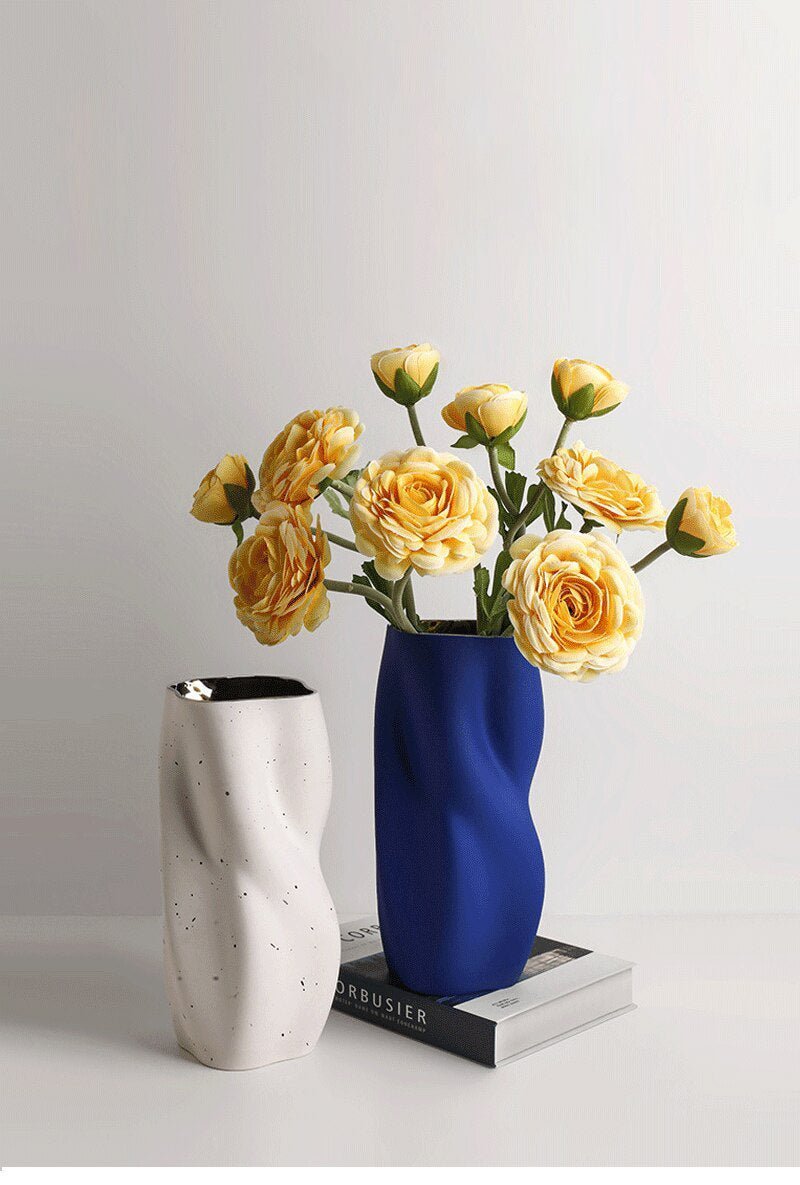 Textured Ceramic Vase with Curved Silhouette and Contemporary Sculpted Form