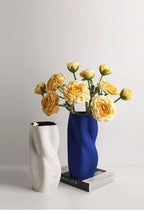Textured Ceramic Vase with Curved Silhouette and Contemporary Sculpted Form