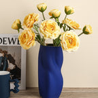 Textured Ceramic Vase with Curved Silhouette and Contemporary Sculpted Form