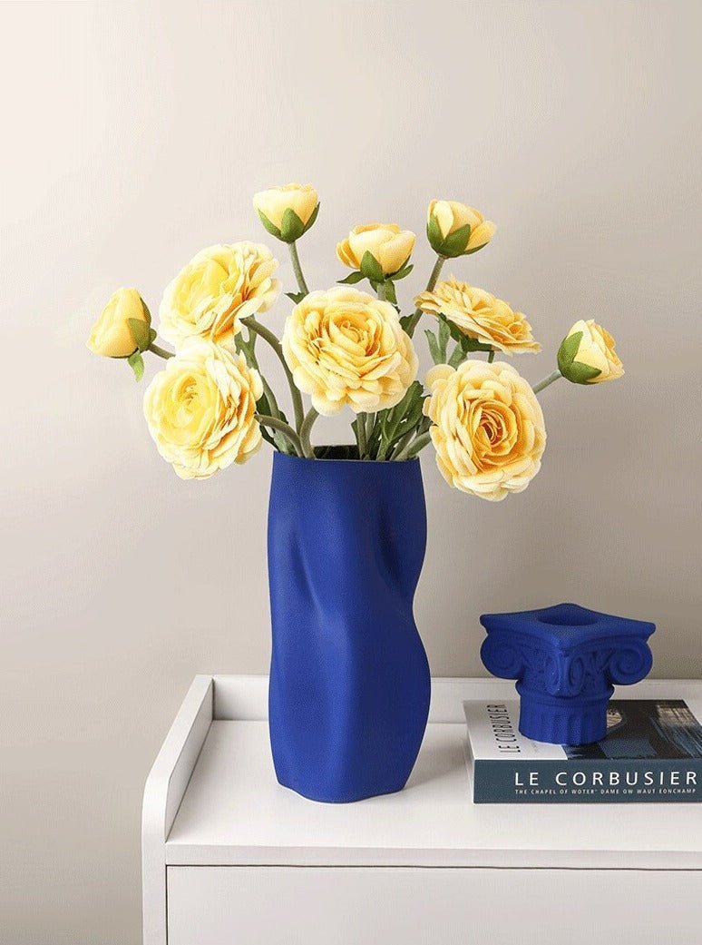 Textured Ceramic Vase with Curved Silhouette and Contemporary Sculpted Form