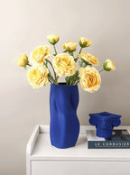 Textured Ceramic Vase with Curved Silhouette and Contemporary Sculpted Form