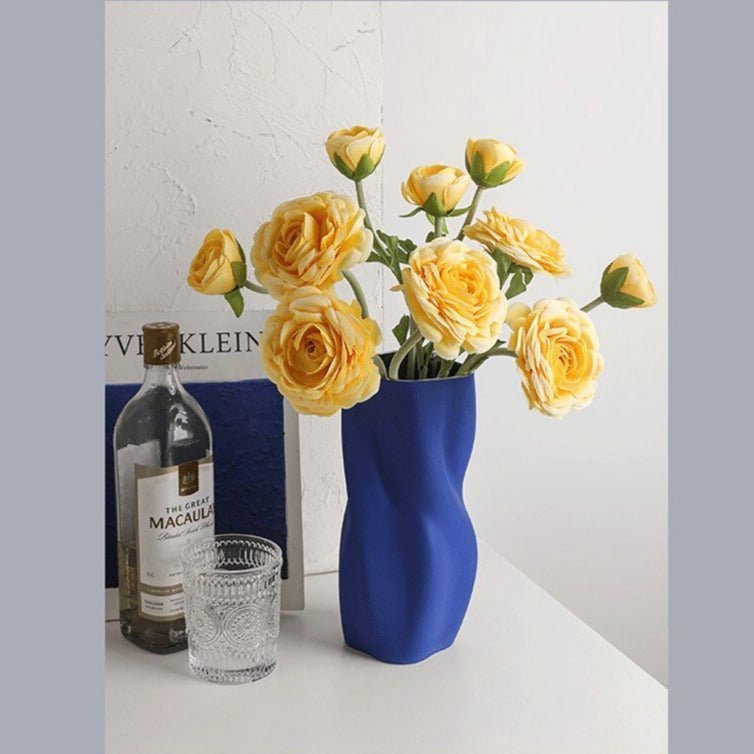 Textured Ceramic Vase with Curved Silhouette and Contemporary Sculpted Form