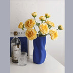 Textured Ceramic Vase with Curved Silhouette and Contemporary Sculpted Form