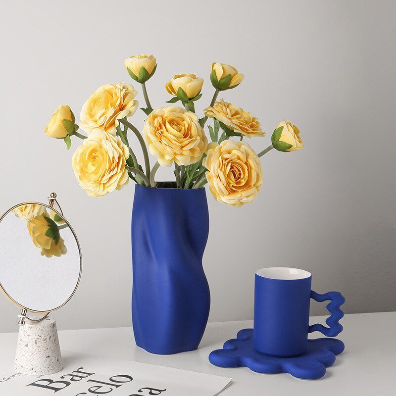 Textured Ceramic Vase with Curved Silhouette and Contemporary Sculpted Form