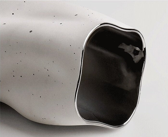 Textured Ceramic Vase with Curved Silhouette and Contemporary Sculpted Form