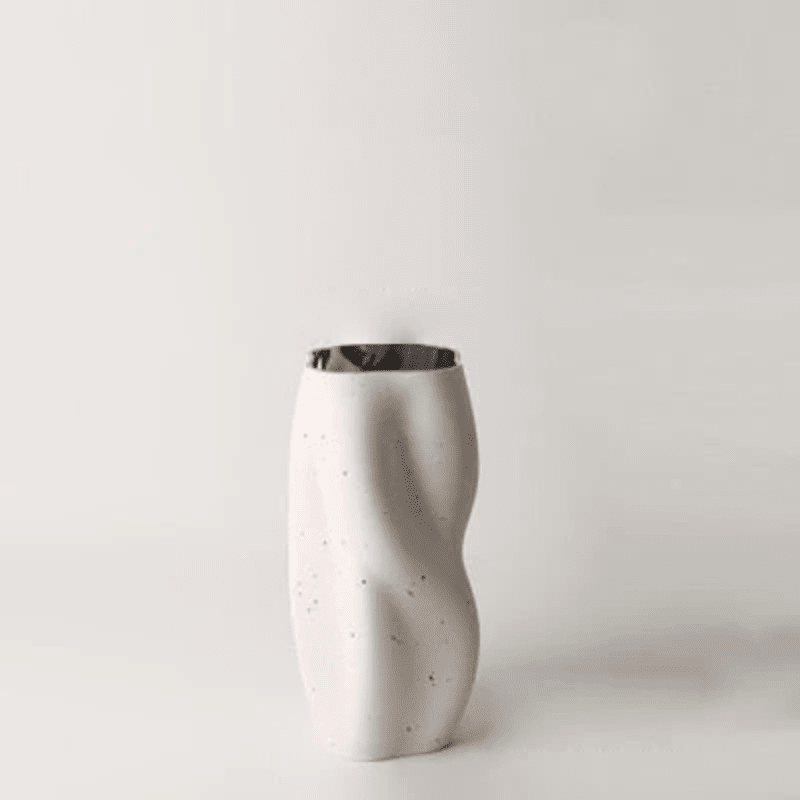 Textured Ceramic Vase with Curved Silhouette and Contemporary Sculpted Form