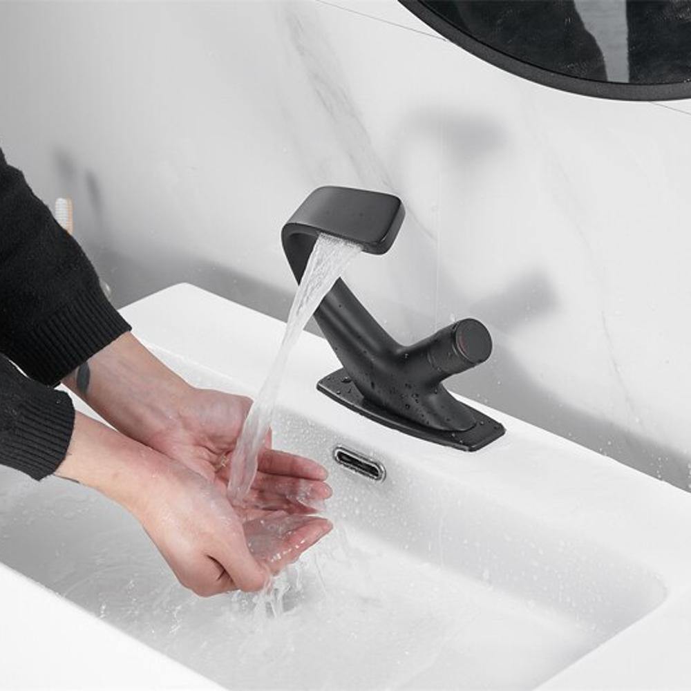 Rubinetto moderno per lavabo da bagno con design scultoreo e bocca a cascata