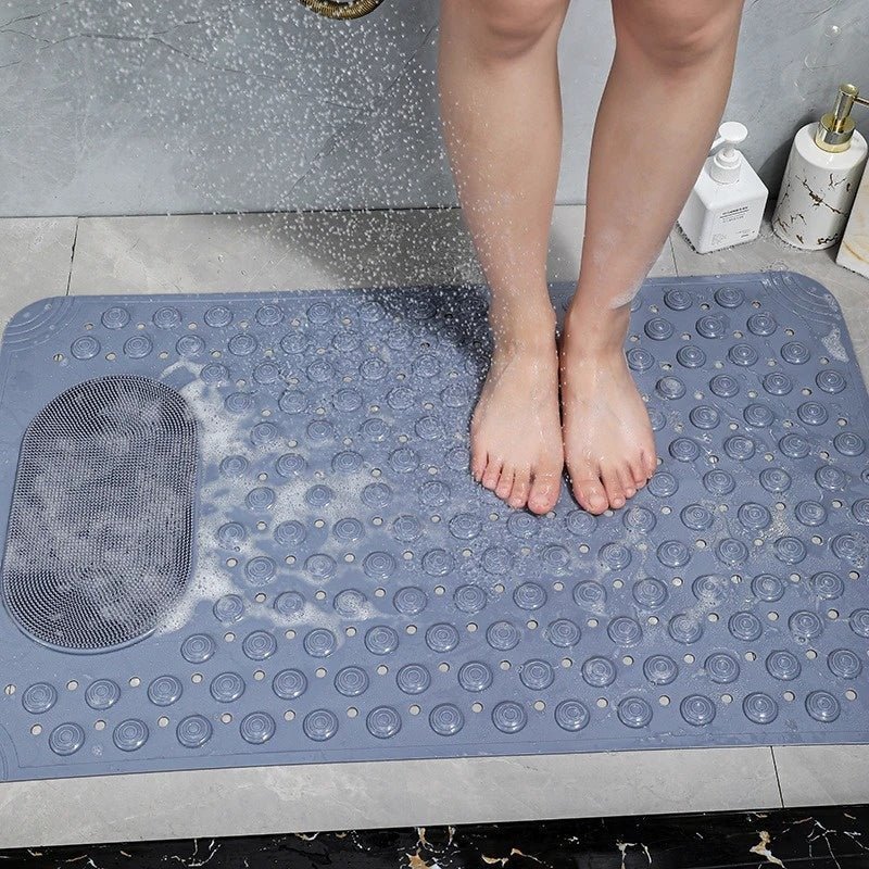Tappetino da bagno antiscivolo con superficie testurizzata e scrubber per piedi integrato