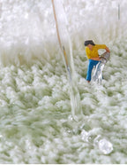 Alfombrilla de baño de felpa con motivo floral y borde en contraste