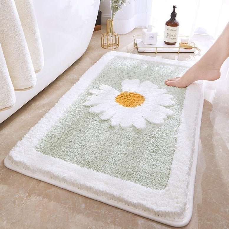 Alfombrilla de baño de felpa con motivo floral y borde en contraste
