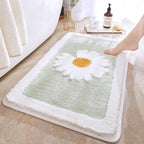 Alfombrilla de baño de felpa con motivo floral y borde en contraste