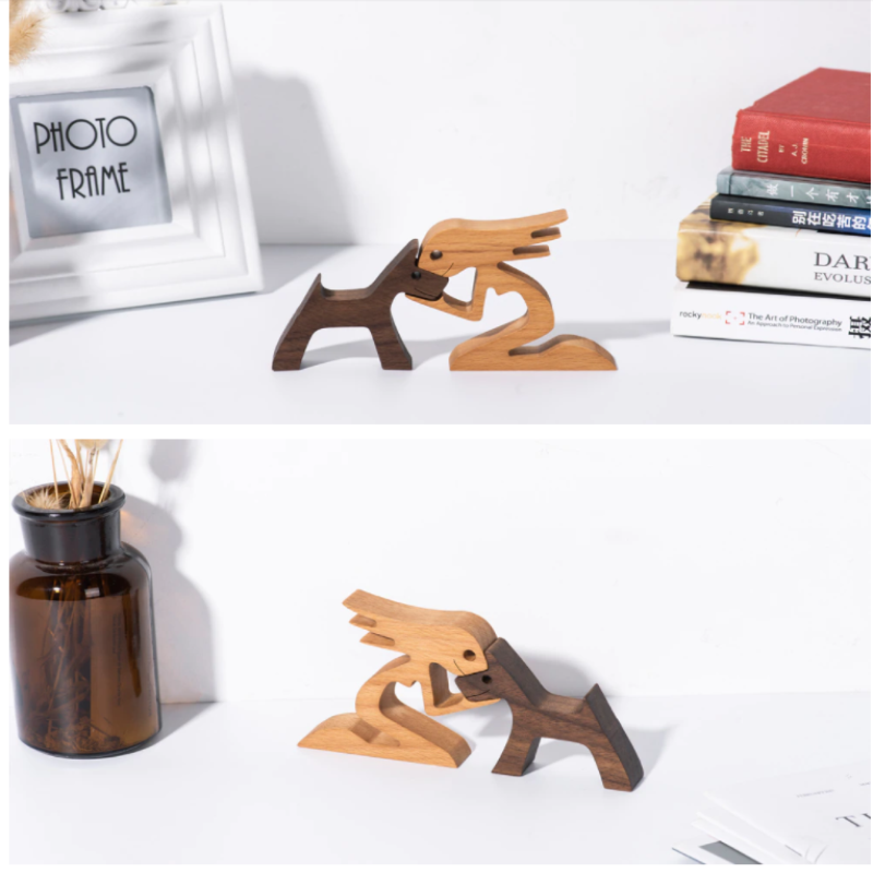Escultura de madera artesanal de una persona y un perro